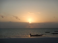 Local Fisherman Getting Ready While the Sun Rises Over the Indian Ocean