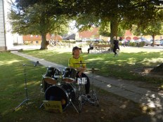 Even had a drummer to play as vehicles came and went